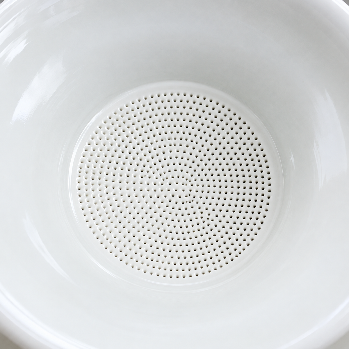 White Porcelain Tea Filter with Stand — product material and construction